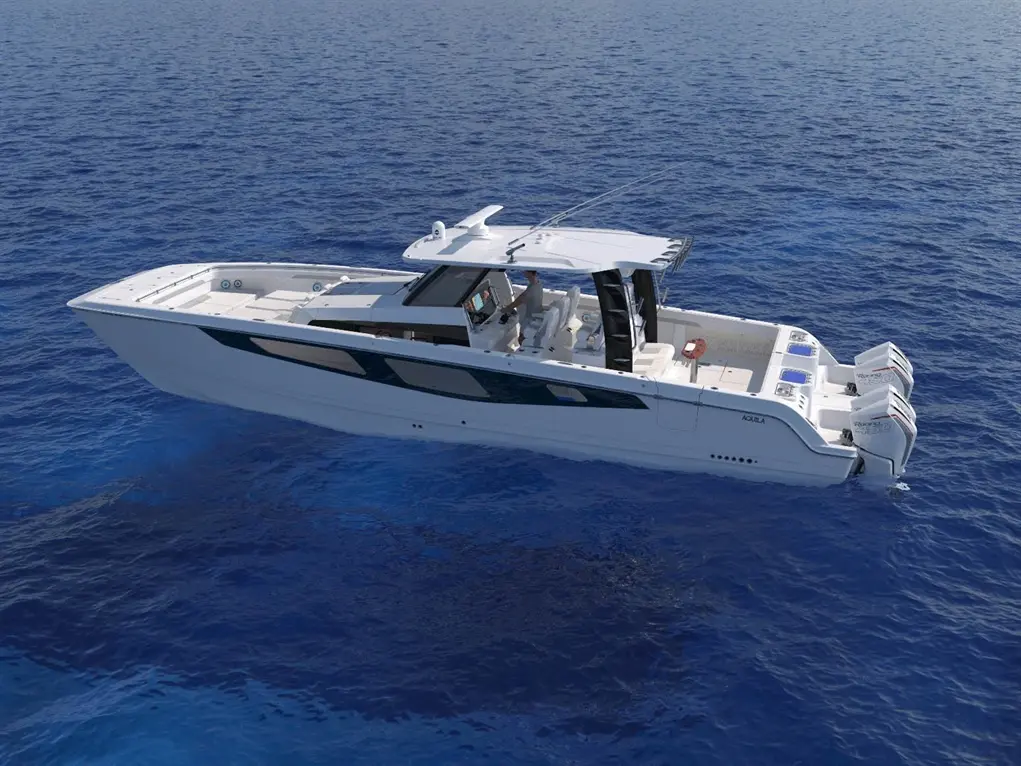 Luxury powerboat 'Aquila' cruising on clear blue water, showcasing sleek design and modern functionalities.